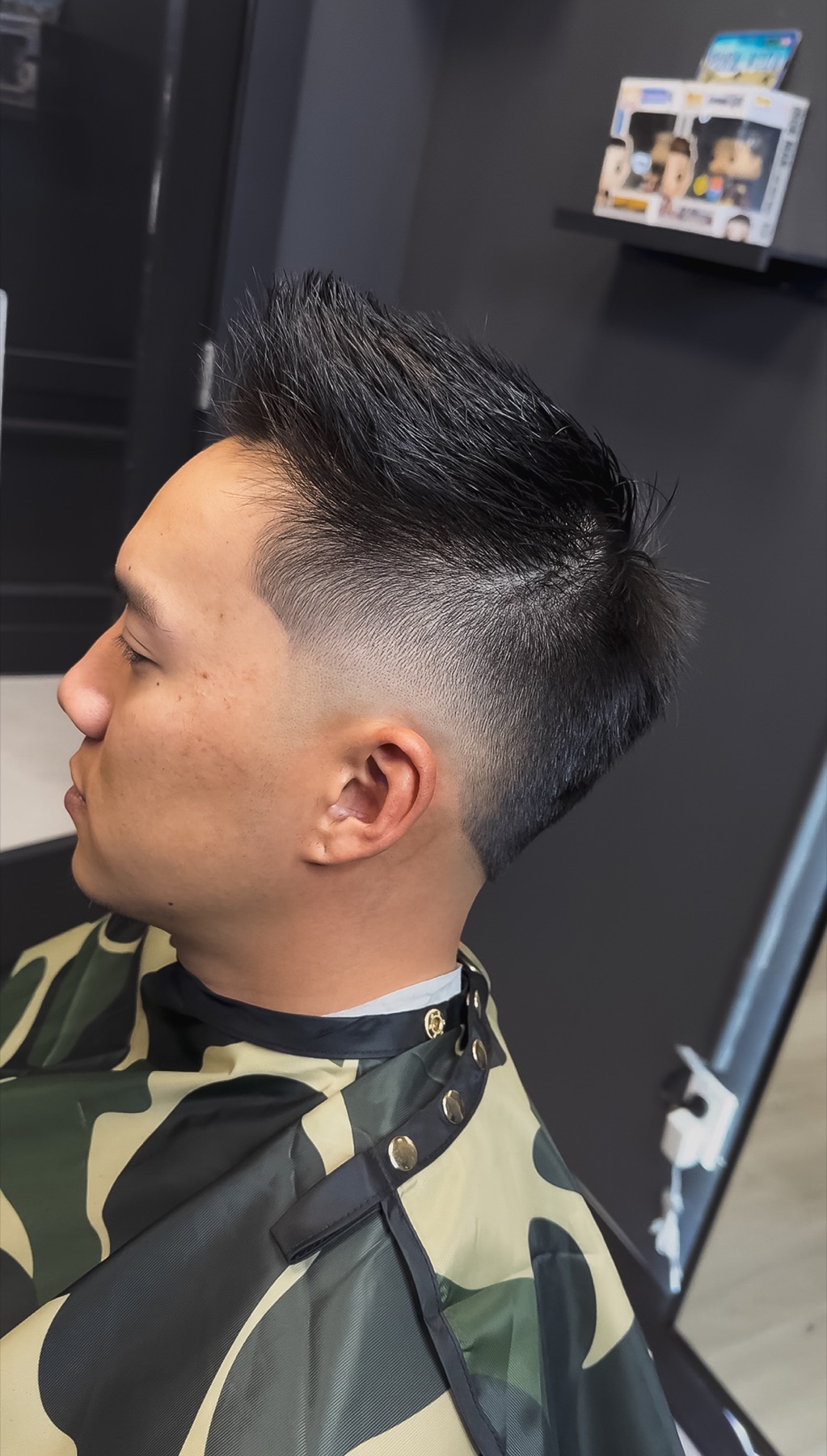 Textured faux hawk fade by DNA Barbershop